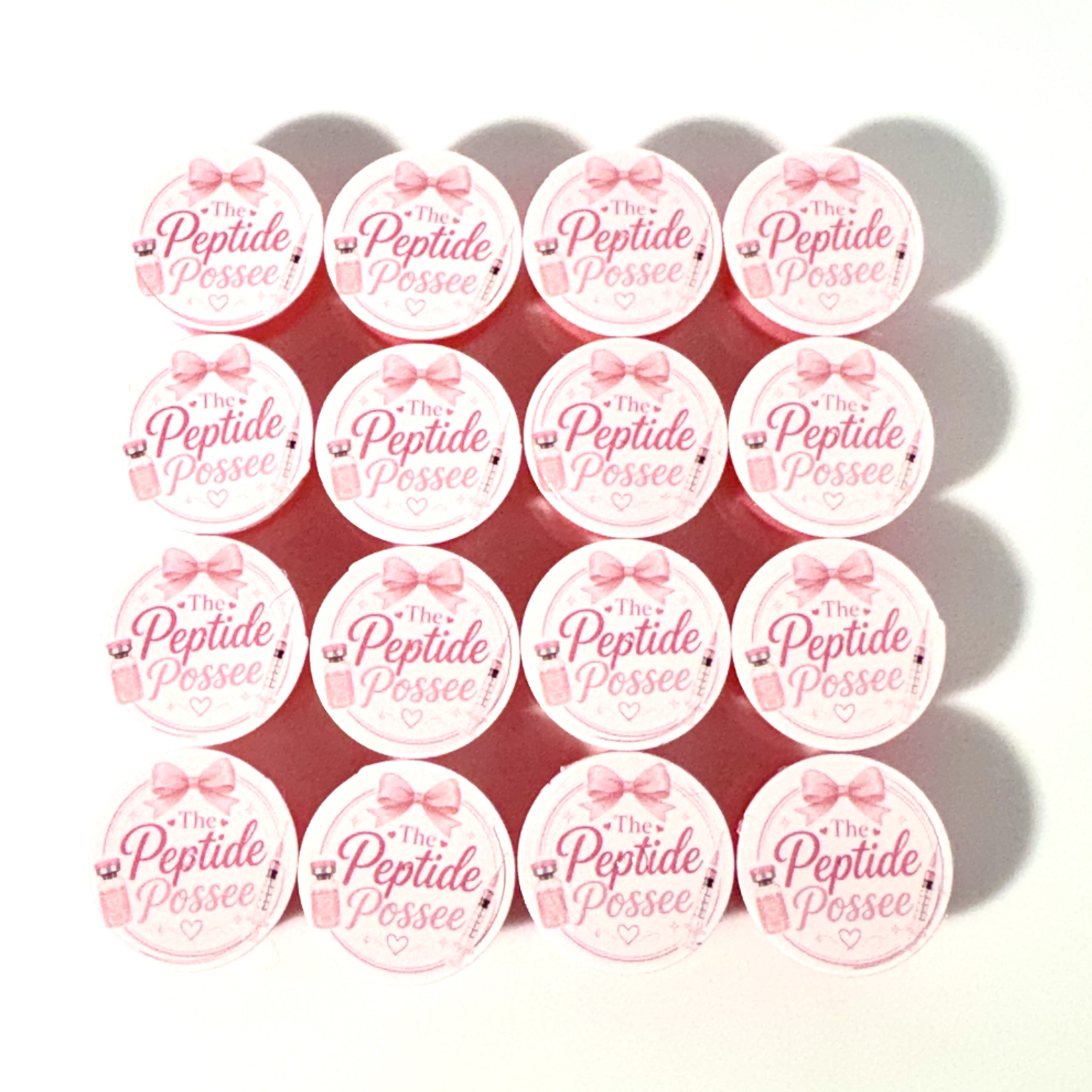 White and pink Peptide Possee branded caps